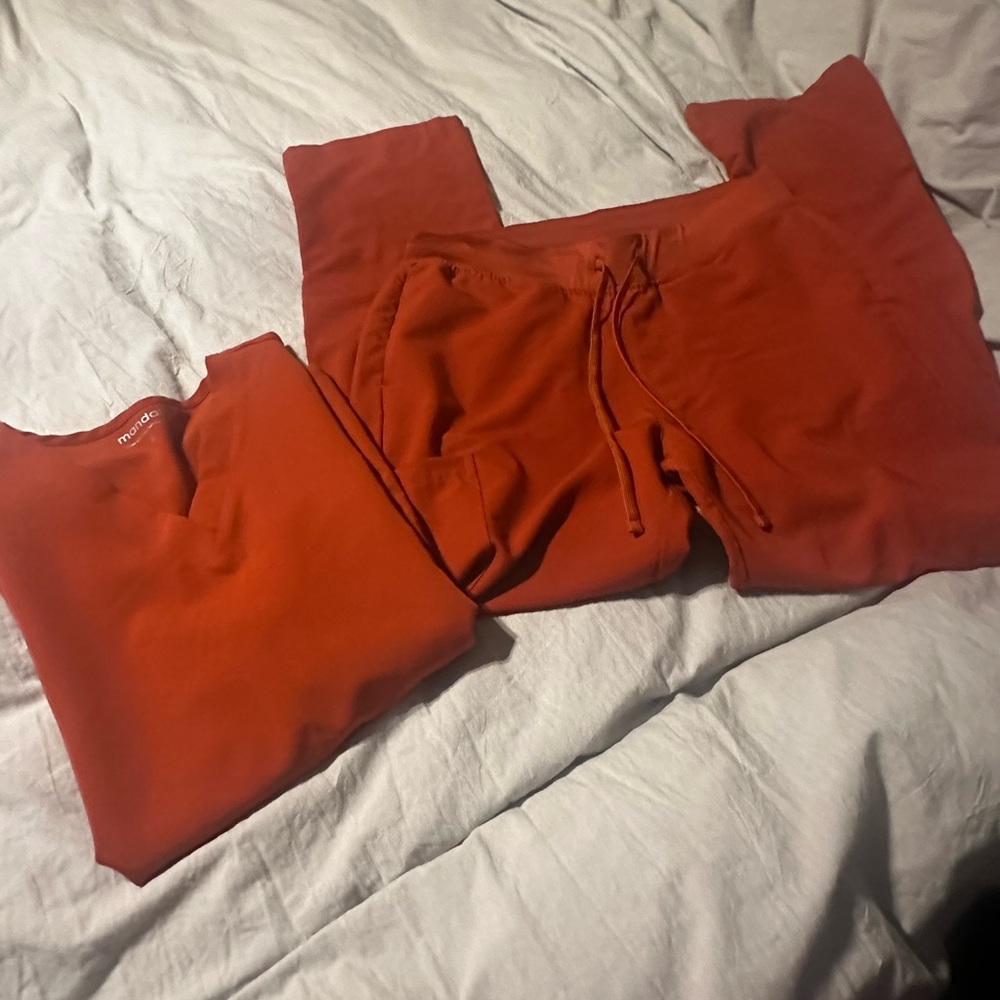 Beautiful mandala scrubs , rust color size medium, regular length.